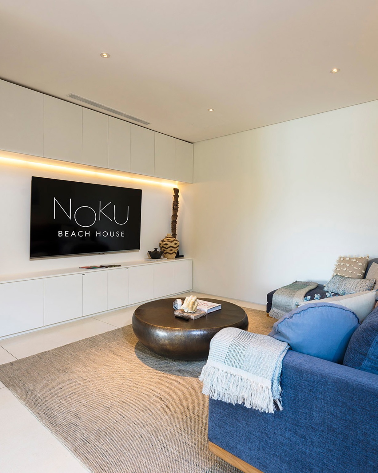 022 Noku Beach House - Wide TV screen and comfortable couch