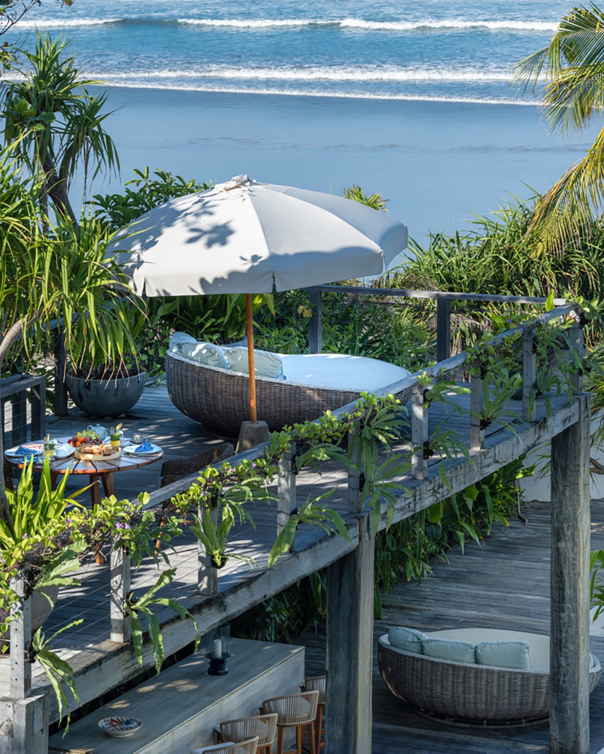 035 Noku Beach House - Shaded wooden deck
